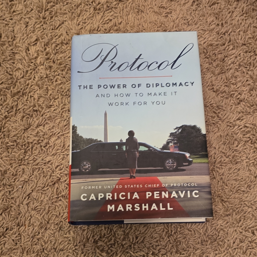 Protocol by Capricia Penavic Marshall - Light Blue & Red Hardcover